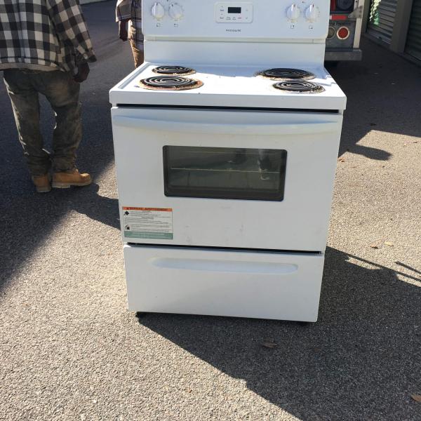 Photo of AC and Electric Stove