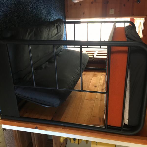 Photo of Futon couch with twin bed above