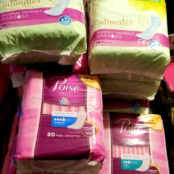 Photo of Poise  & Tena  pads. 