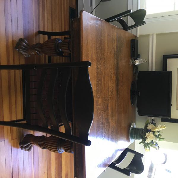 Photo of Square Oak Table With Claw Foot And Three Leaves. Three chairs
