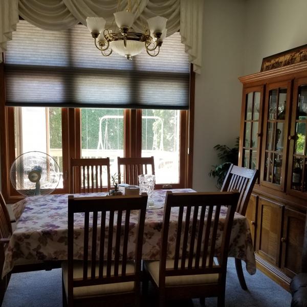 Photo of Dining room table and hutch + buffet 