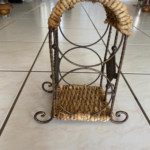 Photo of wine rack, light fixture, Corningware,  basket, 
