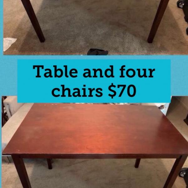 Photo of Table and  four chairs 
