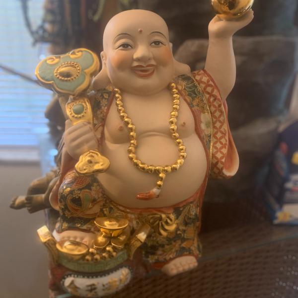 Photo of Laughing hand painted lucky buddha