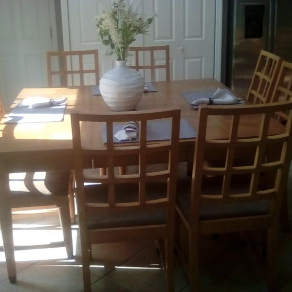 Photo of Wood Table with 8 Chairs