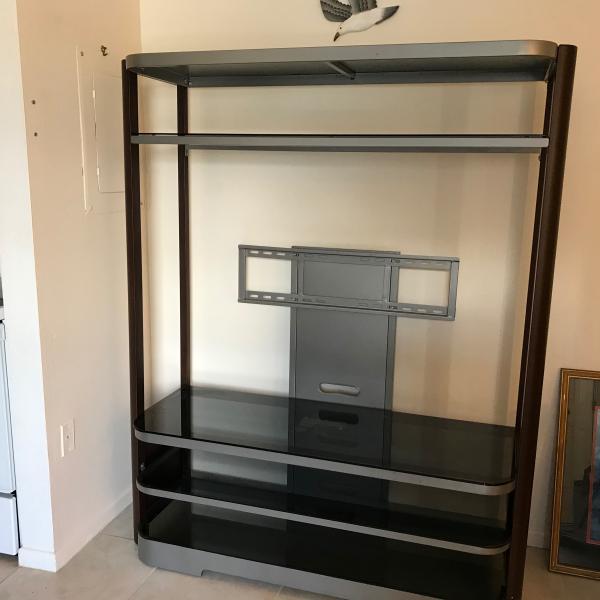 Photo of Wall shelve unit with attached TV mounting 