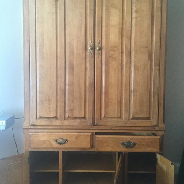 Photo of Baker’s Furniture solid wood entertainment center