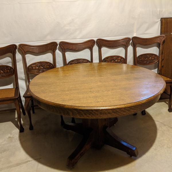 Photo of Antique pedestal table and 5 chairs.