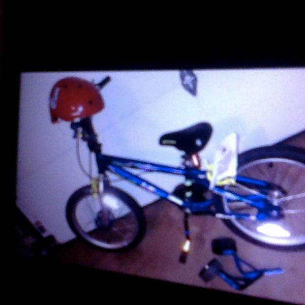 Photo of child's bicycle(with trainer wheels)