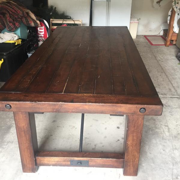 Photo of Heavy wood table.
