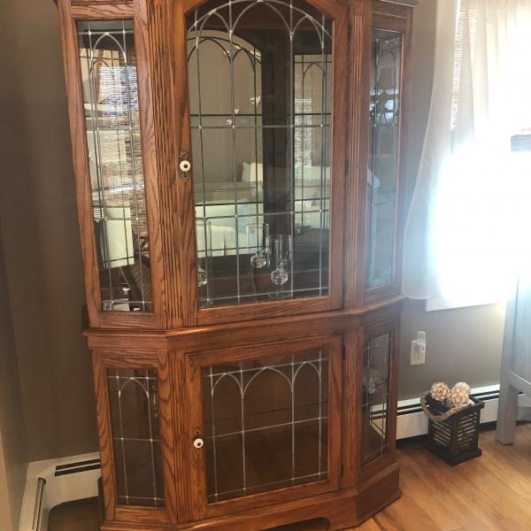 Photo of Penn House Lighted  glass cabinet 