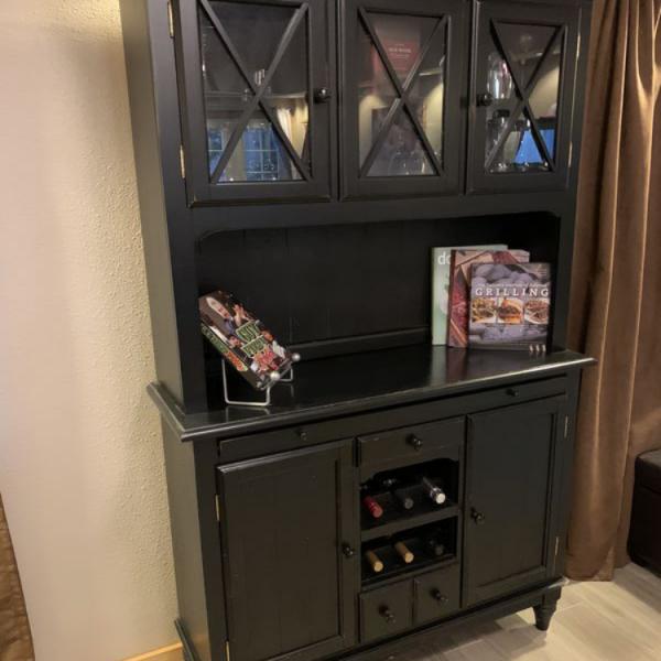 Photo of Black Hutch with Lots of Storage and Accent Lighting