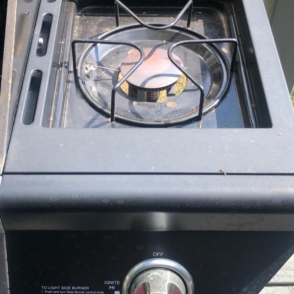 Photo of Grill Master Four Burner Propane Grill with propane tank