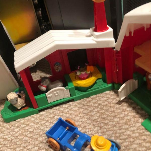 Photo of Fisher Price Farm includes the animals and people