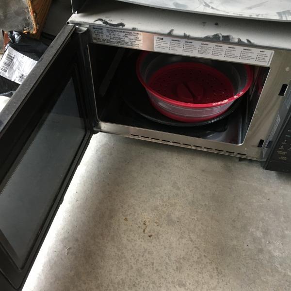 Photo of RV microwave and hardware