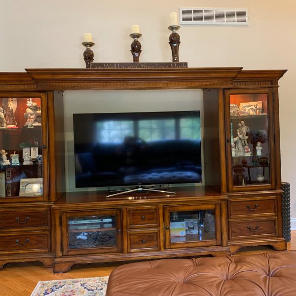 Photo of Entertainment Center - Dark brown wood 70”, look at descriptions for details.