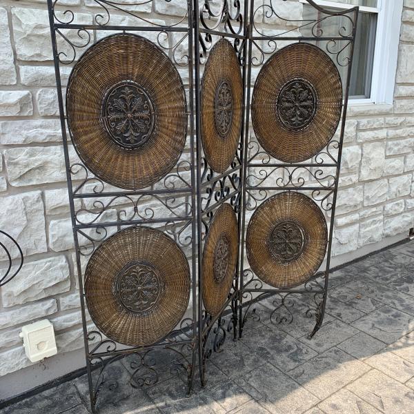 Photo of Ornate Metal and Wicker Screen