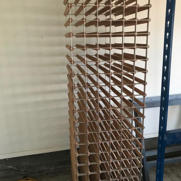 Photo of Wood wine rack for 120 bottles