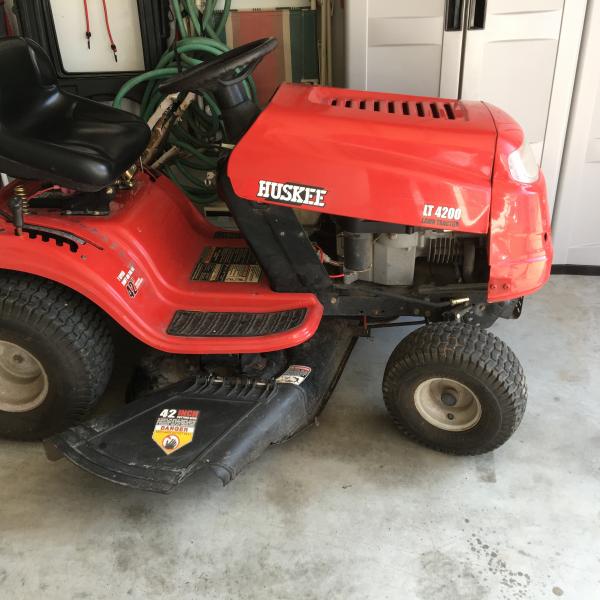 Photo of Huskee riding mower and attachments