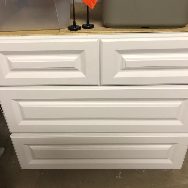 Photo of White matching cabinets