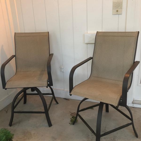 Photo of 4 High patio swivel chairs 