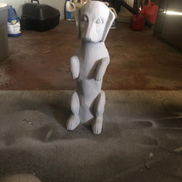 Photo of wood carved dog 