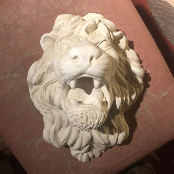Photo of Decorative lion's head wall piece 