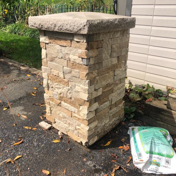 Photo of brick face concrete post