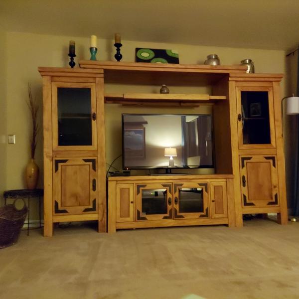 Photo of solid wood entertainment center