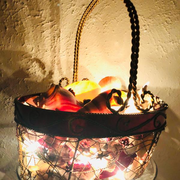 Photo of Lighted basket of shells