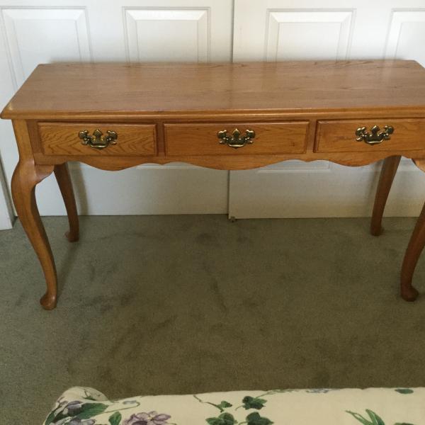 Photo of Solid oak sofa or foyer table.