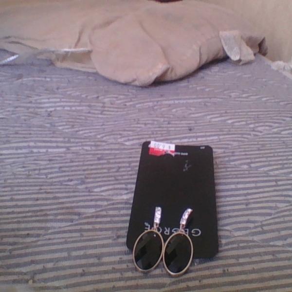 Photo of black and silver ear rings