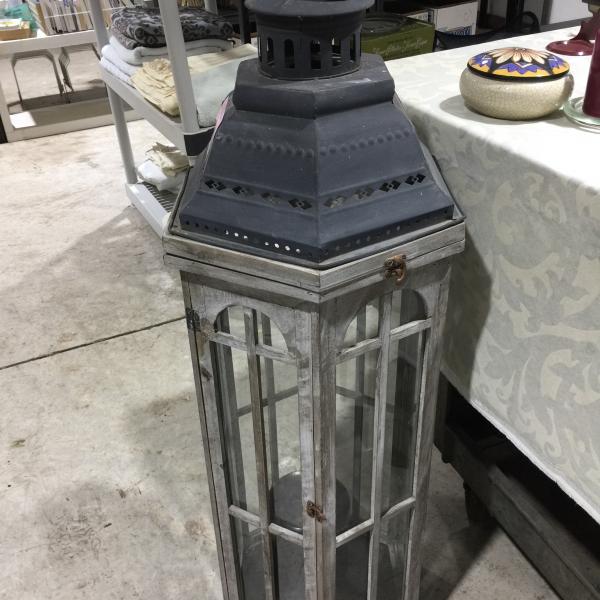 Photo of Very tall lantern indoor outdoor. Use with a candle