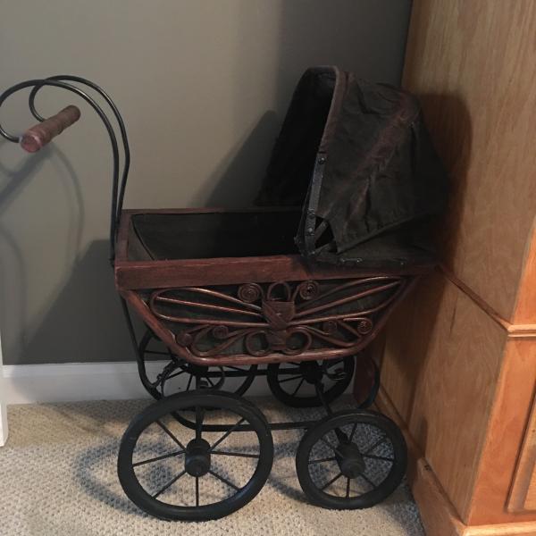 Photo of Antique doll buggy