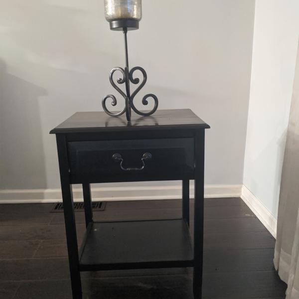 Photo of Accent table with candle holder