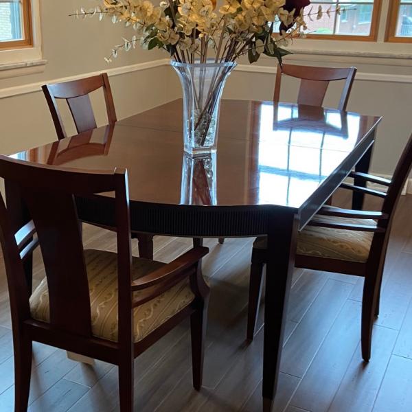 Photo of Dining room table and four chairs