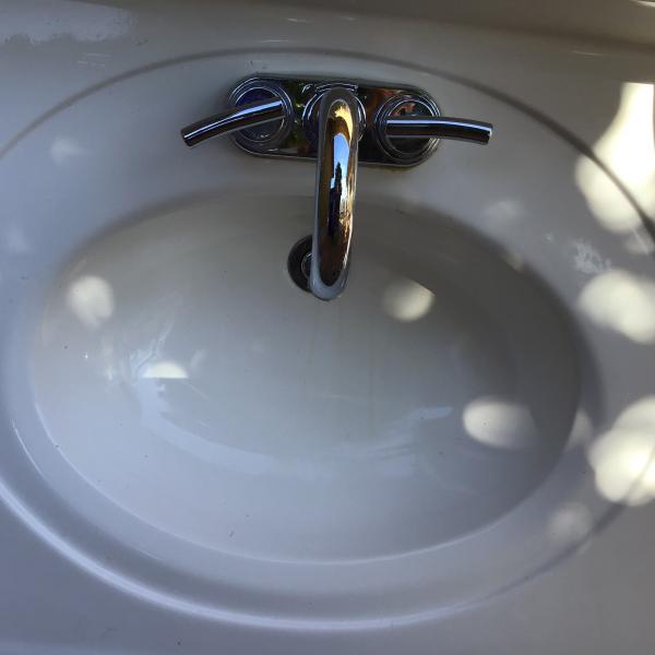 Photo of Bathroom sink top and faucet