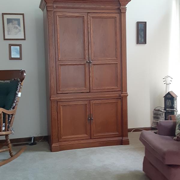 Broyhill armoire with matching coffeetable. snaplist