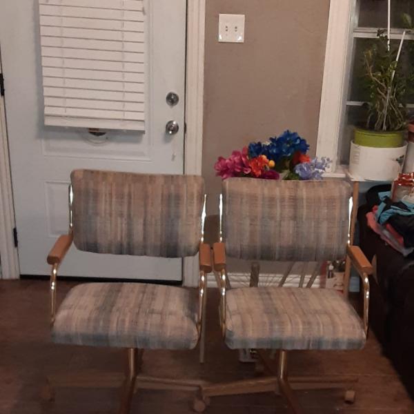 Photo of Dining room chairs  6 swivel  with arm rests 