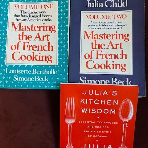 Photo of Julia Child, cookbooks, set