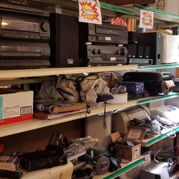 Photo of Indoor Sale with Lots of Electronics and then some