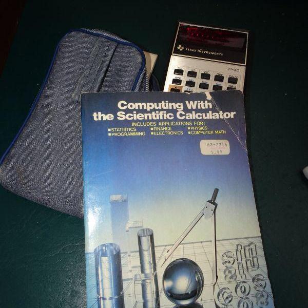 Photo of Texas Instrument Calculator & Book #31