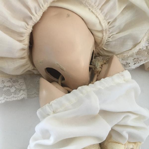 Photo of Vintage Porcelain Doll With Roped Joints 