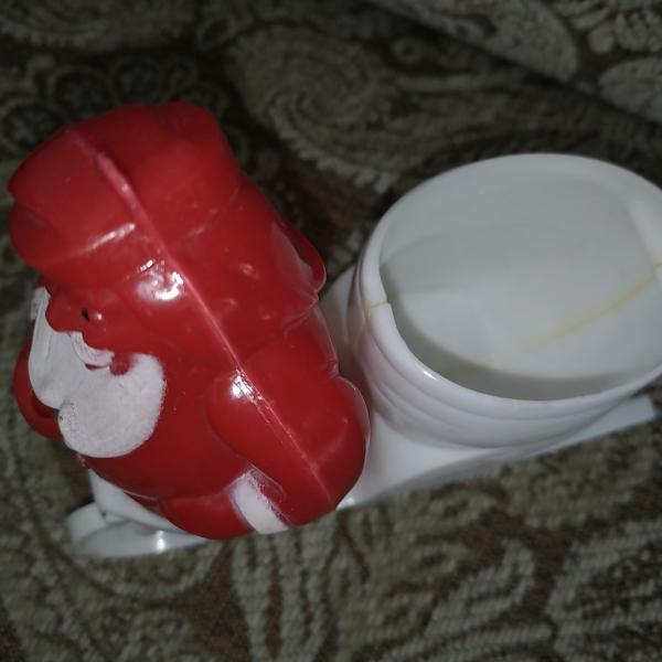 Photo of Vintage plastic Santa and sleigh candy holder