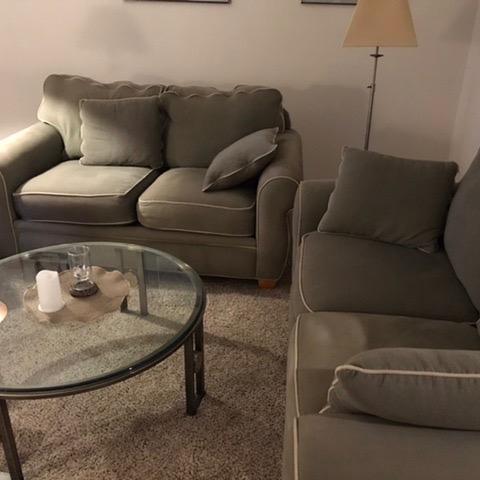 Photo of 2 loveseats with coffee table