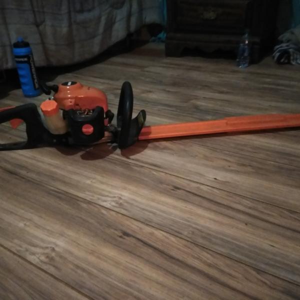 Photo of Echo HG - 155 hedge trimmer with 30 inch attached trimmer