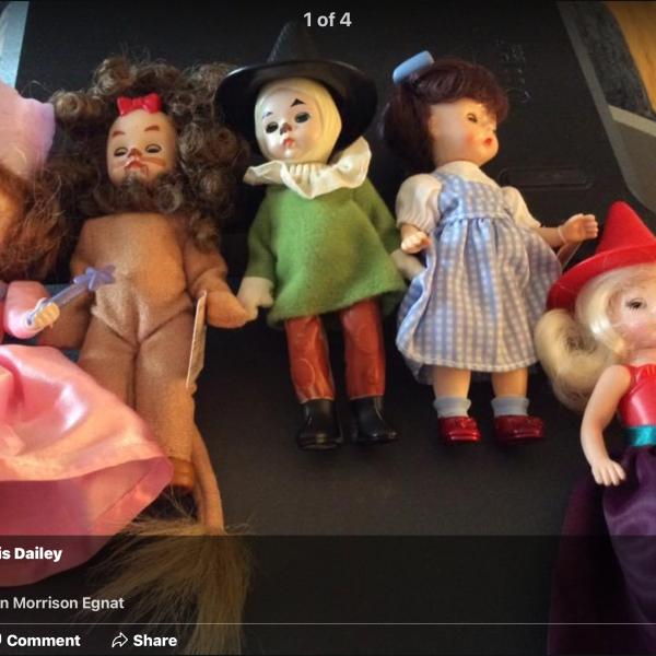 Photo of Wizard of Oz Glenda, cowardly lion, wicked witch, scarecrow, Dorothy mini dolls