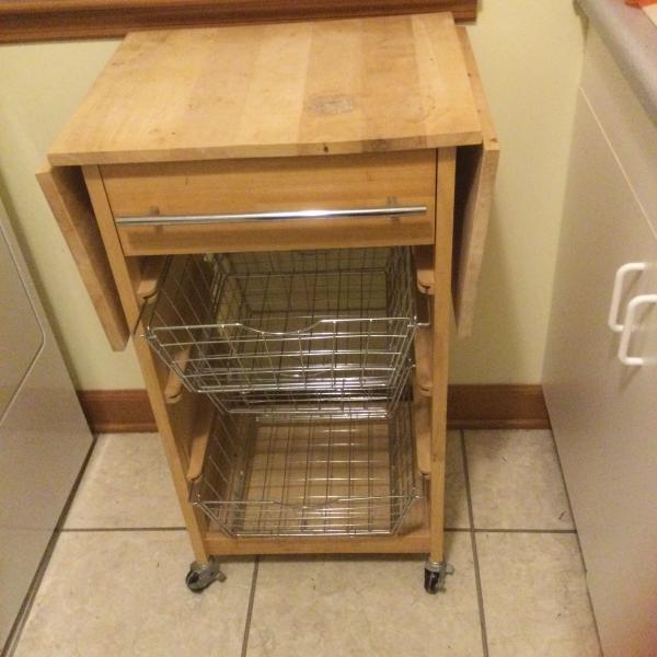 Photo of Wooden kitchen mini island  portable cart