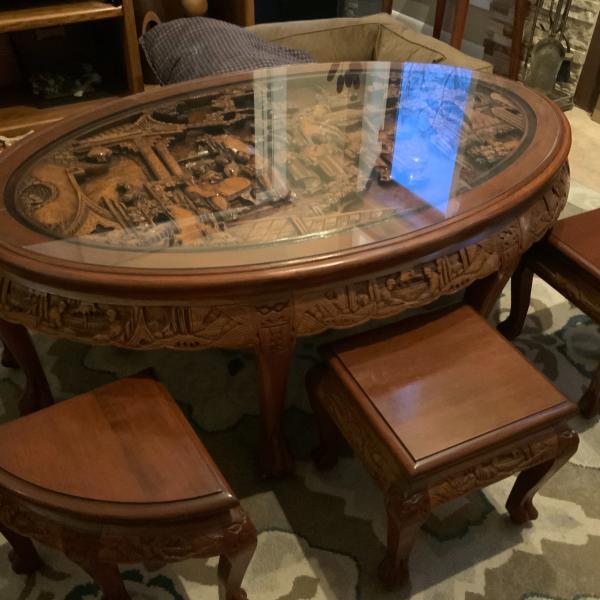 Photo of Antique carved mahogany tea table  with 6 nesting stools 
