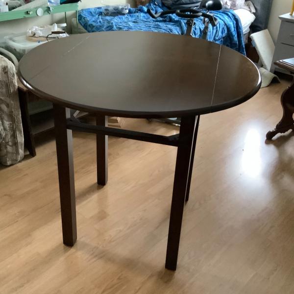 Photo of Folding sides table 